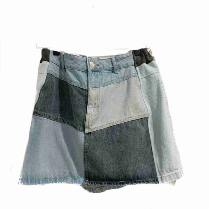 a pair of shorts hanging on a clothes line.