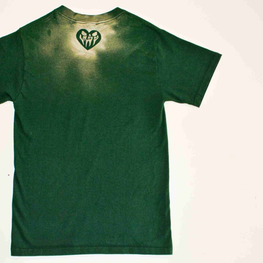 a green t - shirt with a heart on the chest.