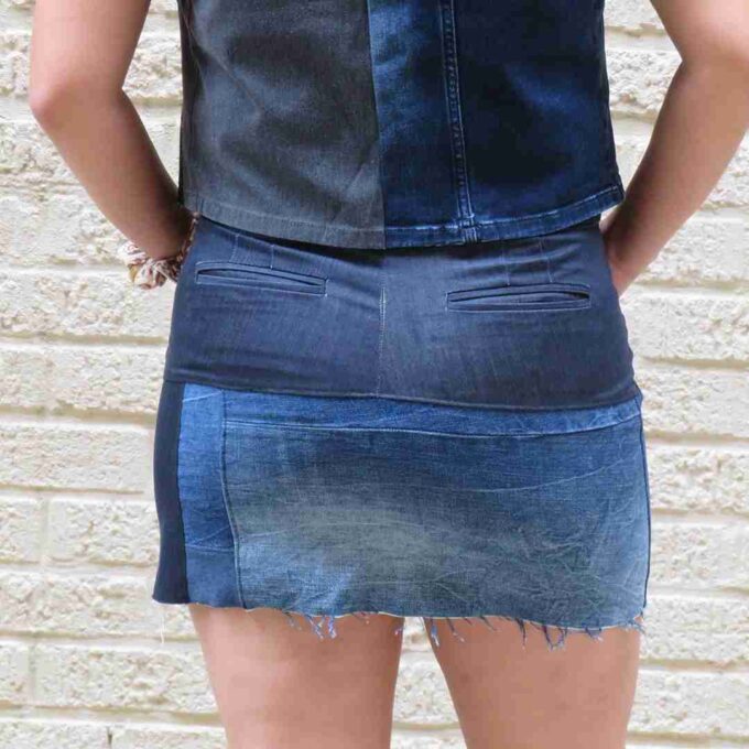 the back of a woman's jean skirt.
