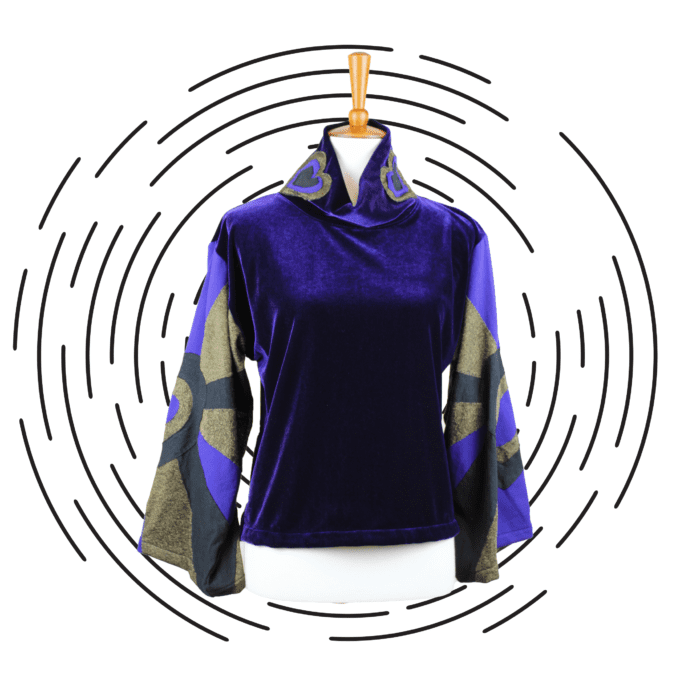 a blue and grey top on a mannequin.