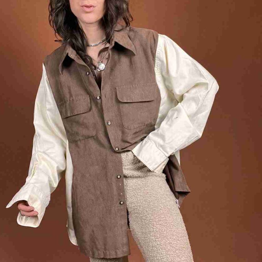 a woman is posing for a picture wearing a shirt and pants.