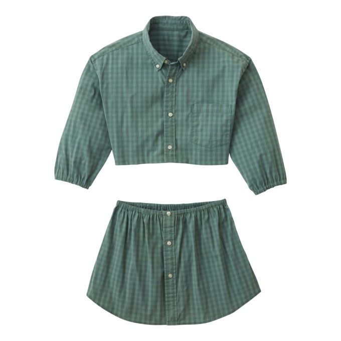A woman wearing the Caterpillar Picnic (green and white checkered two-piece set).
