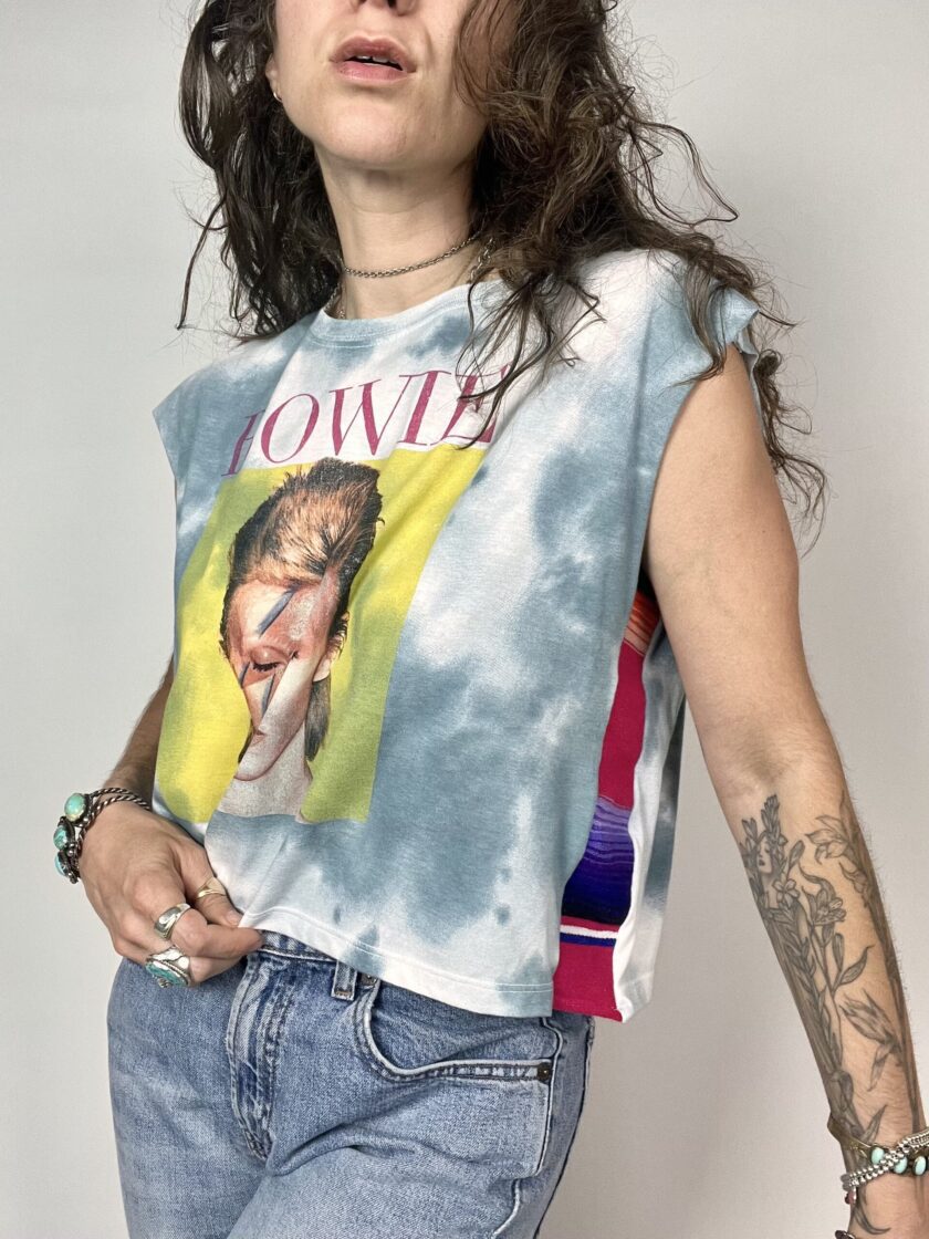 a woman with a cigarette in her mouth.