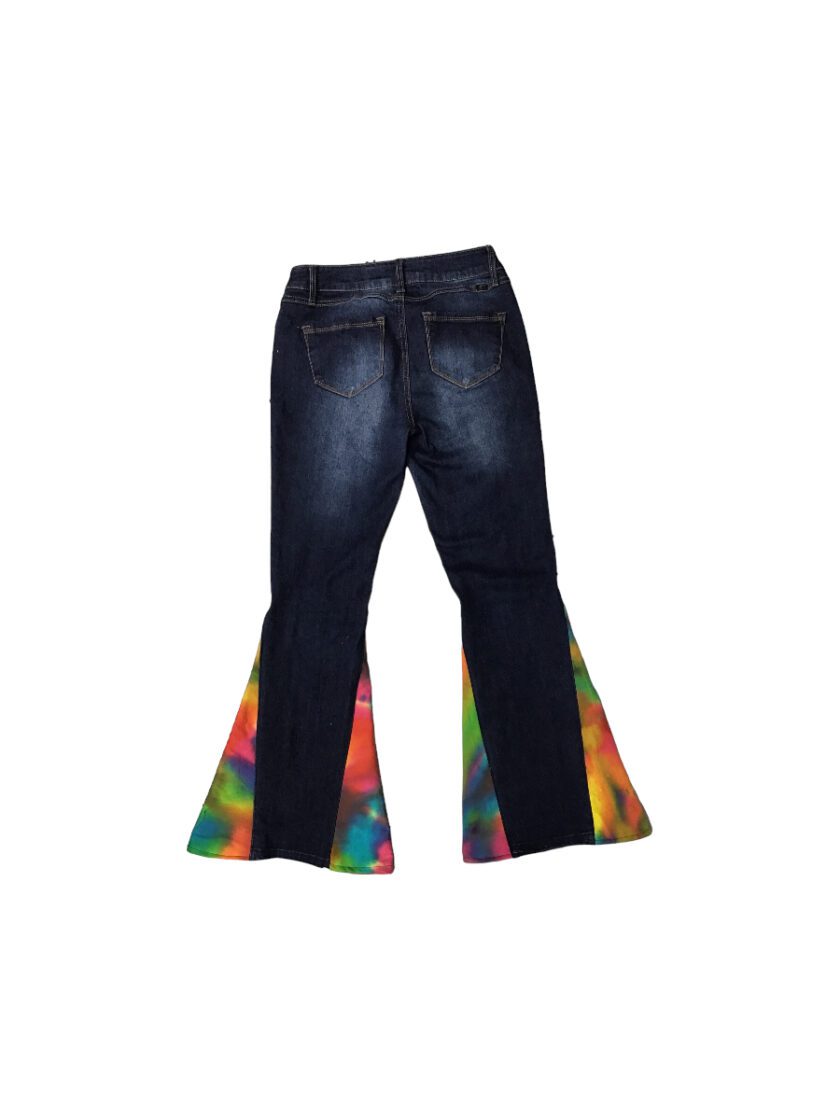 A pair of women's jeans with a colorful tie dye design.