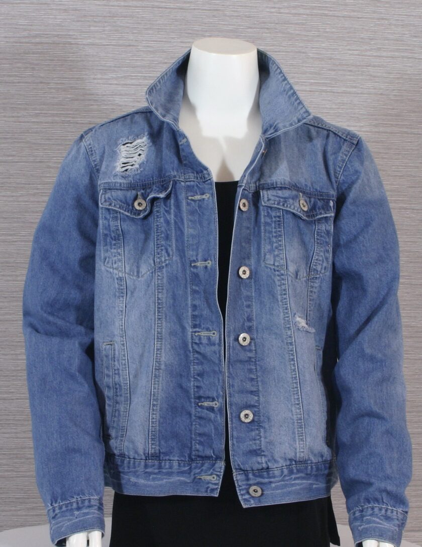 A blue denim jacket on a mannequin mannequin.