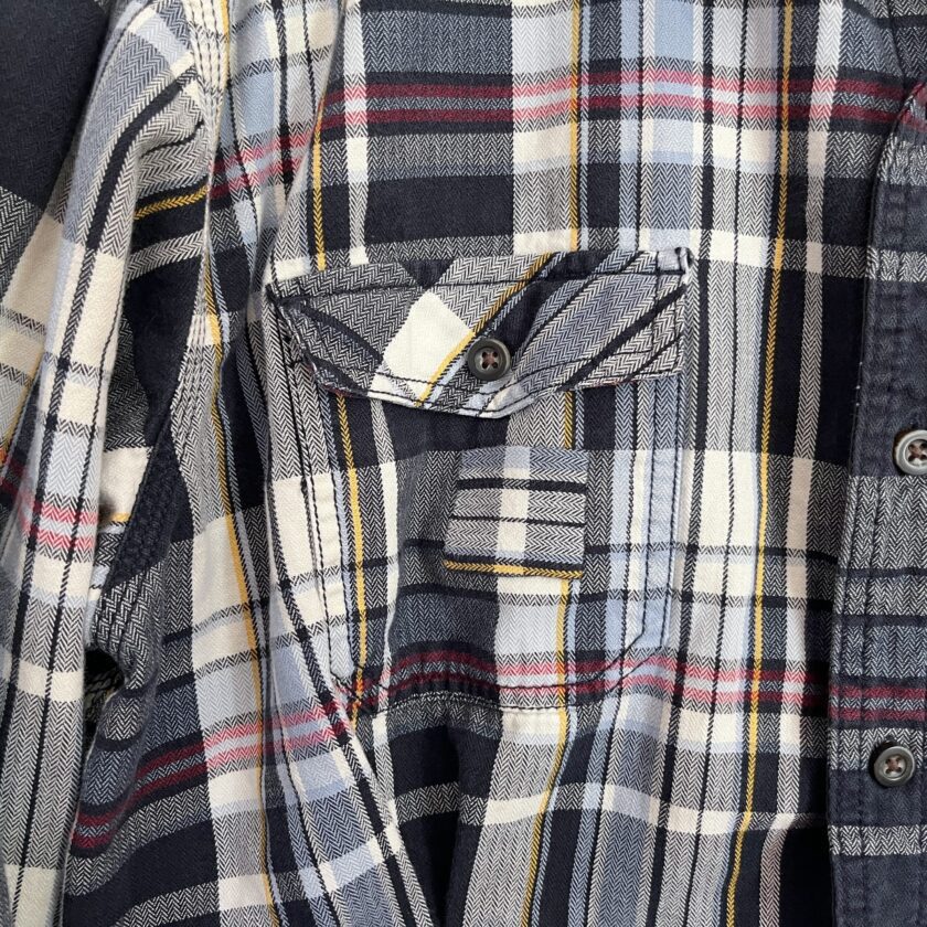 A close up of a plaid shirt.