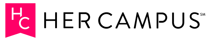a pink ribbon with the letter c on it.